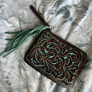 Floral Embossed Leather Clutch with Tassel